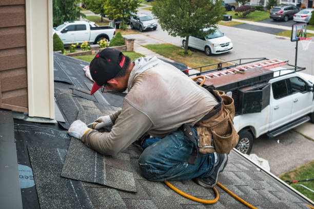 Professional Roofing technician working in Meadow Lakes, AK
